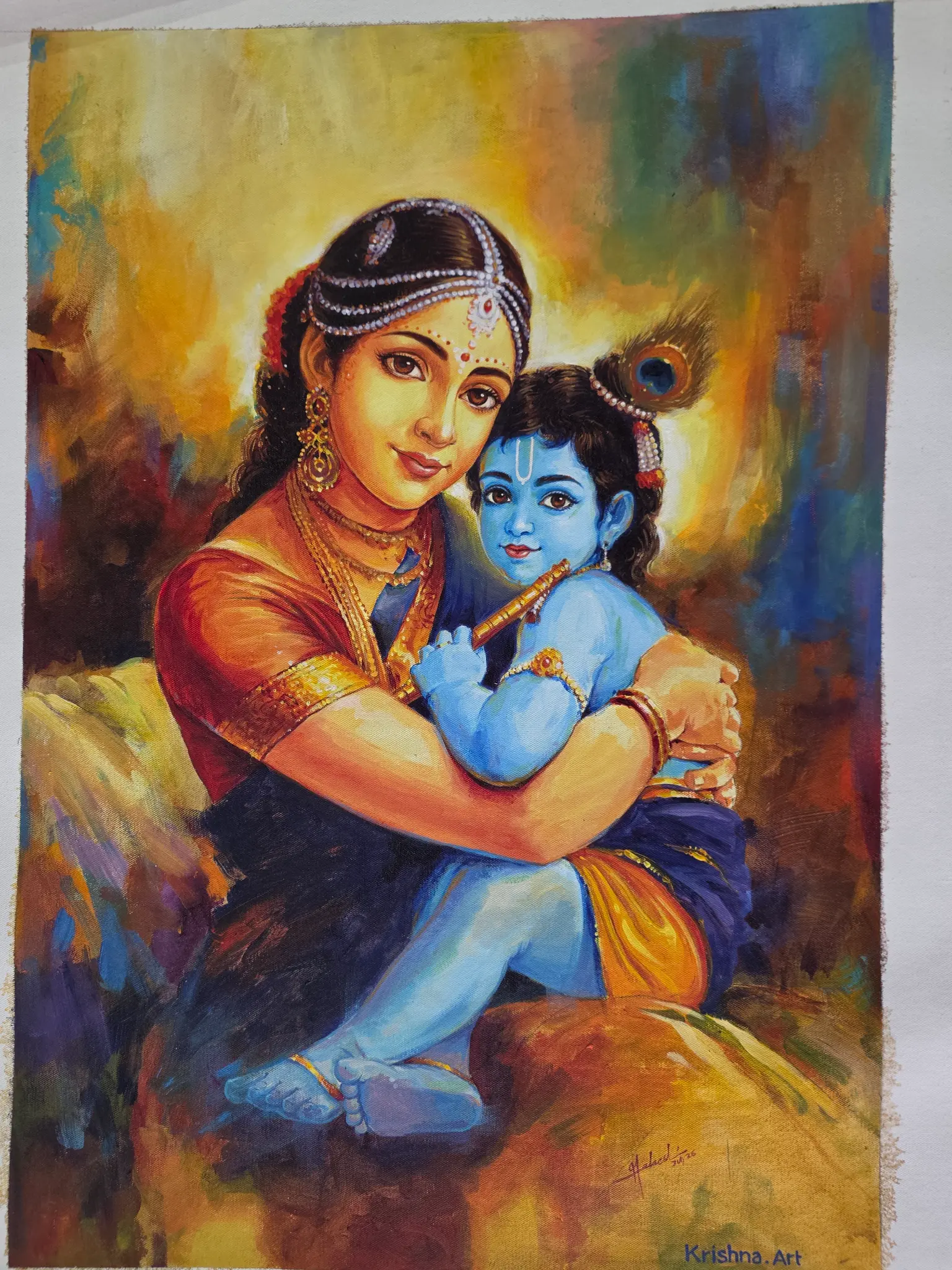 Yashoda and Bala Krishna displayed in a pooja room